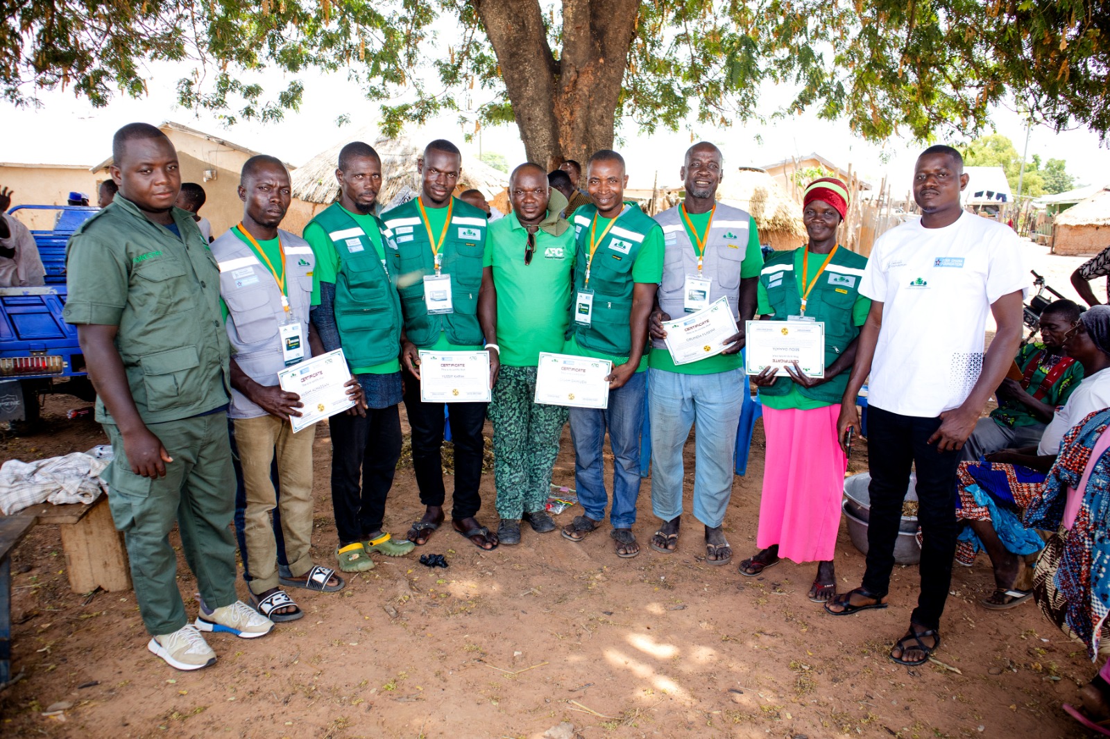 Community volunteers receiving certificates